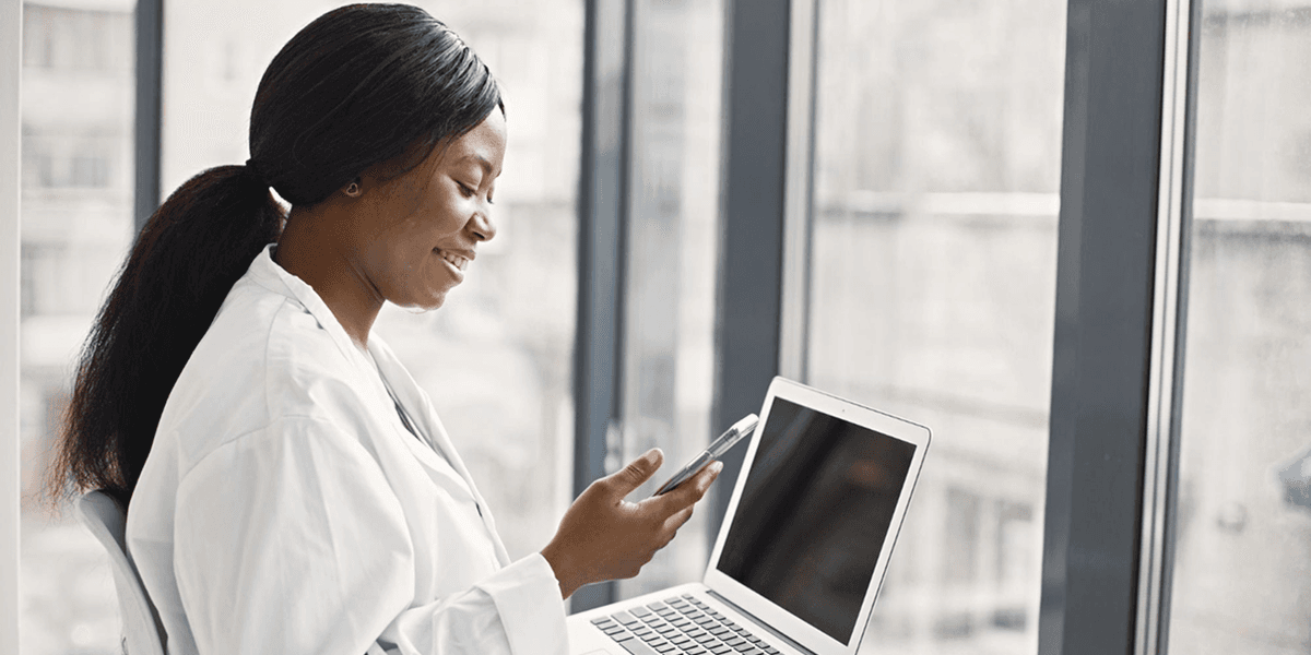 Healthcare professional using laptop